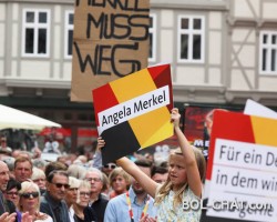 Demonstrators shouted at Merkel, she replied to them.